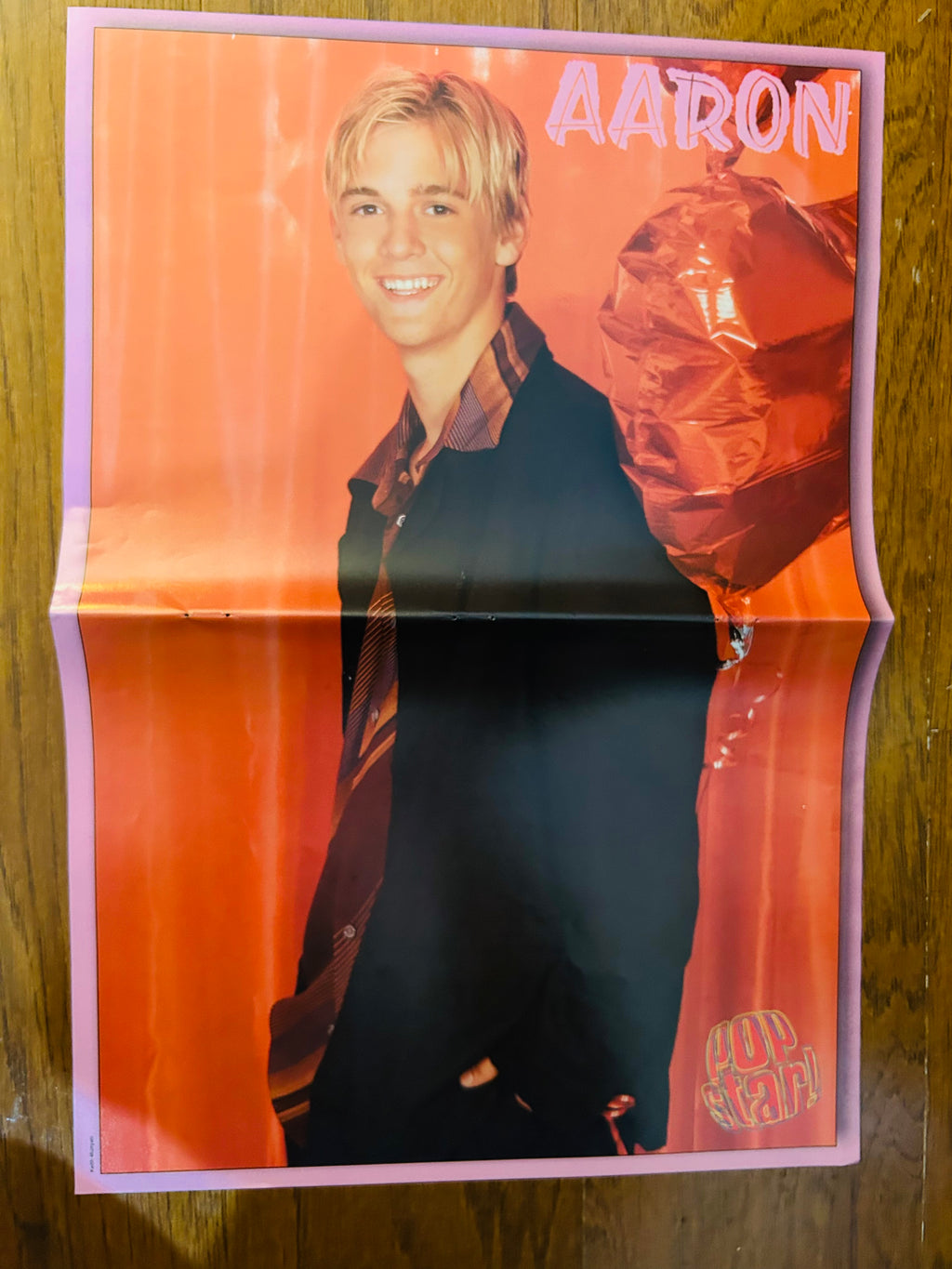 Aaron Carter Pop Star poster reverse with orange background and purple border