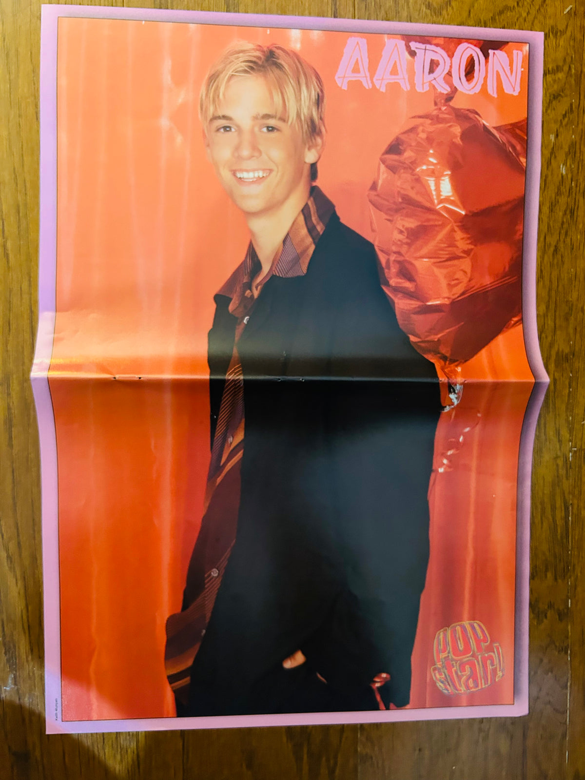 Aaron Carter Pop Star poster reverse with orange background and purple border