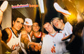 J-14 magazine double-sided poster side A featuring all five Backstreet Boys backstage in USA basketball jerseys with Champion and flame graphics fists out under dramatic stage lighting, backstreet boys in rainbow bubble font top left, J-14 logo bottom left