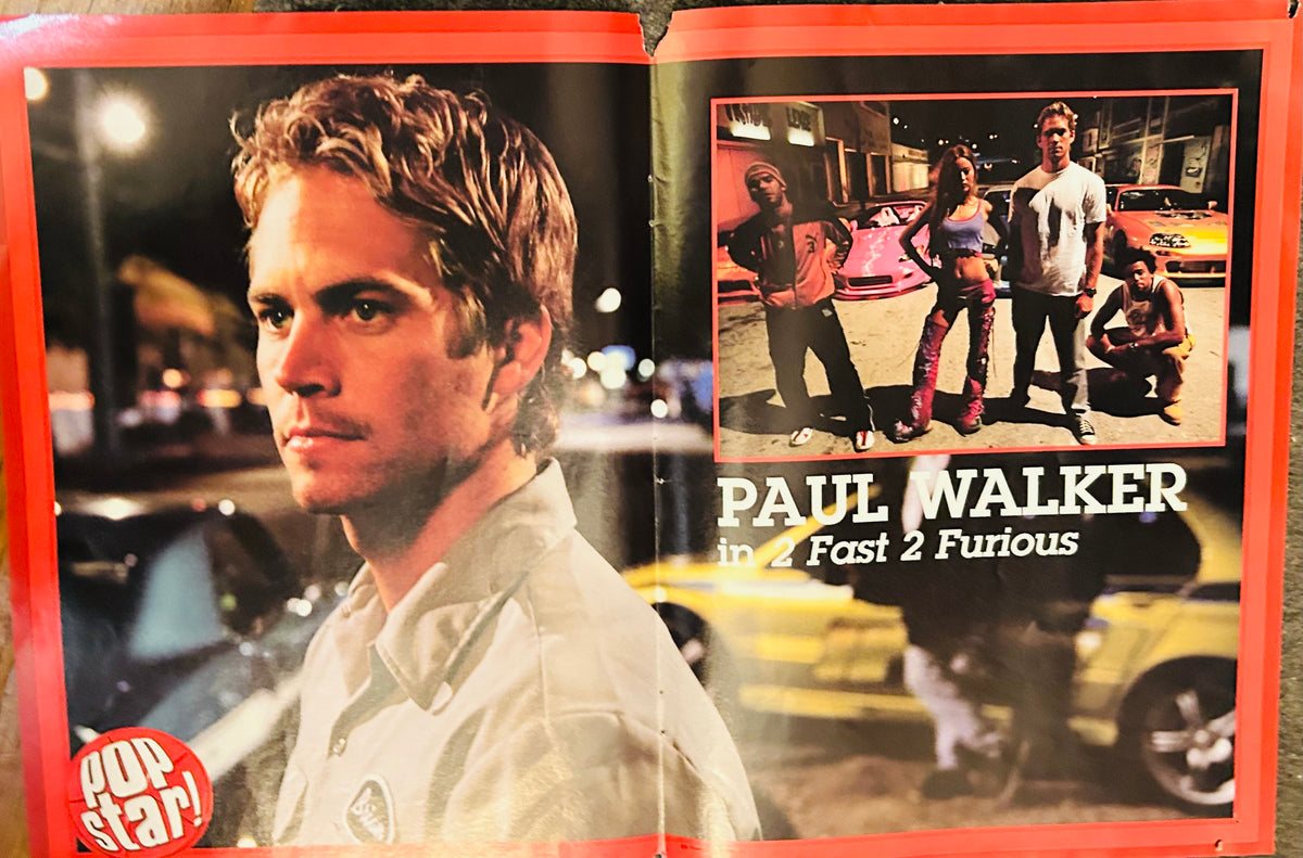 Pop Star! magazine double-sided poster side B featuring Paul Walker in 2 Fast 2 Furious moody nighttime street racing scene with cast group inset photo and 2 Fast 2 Furious title text, Pop Star logo bottom left