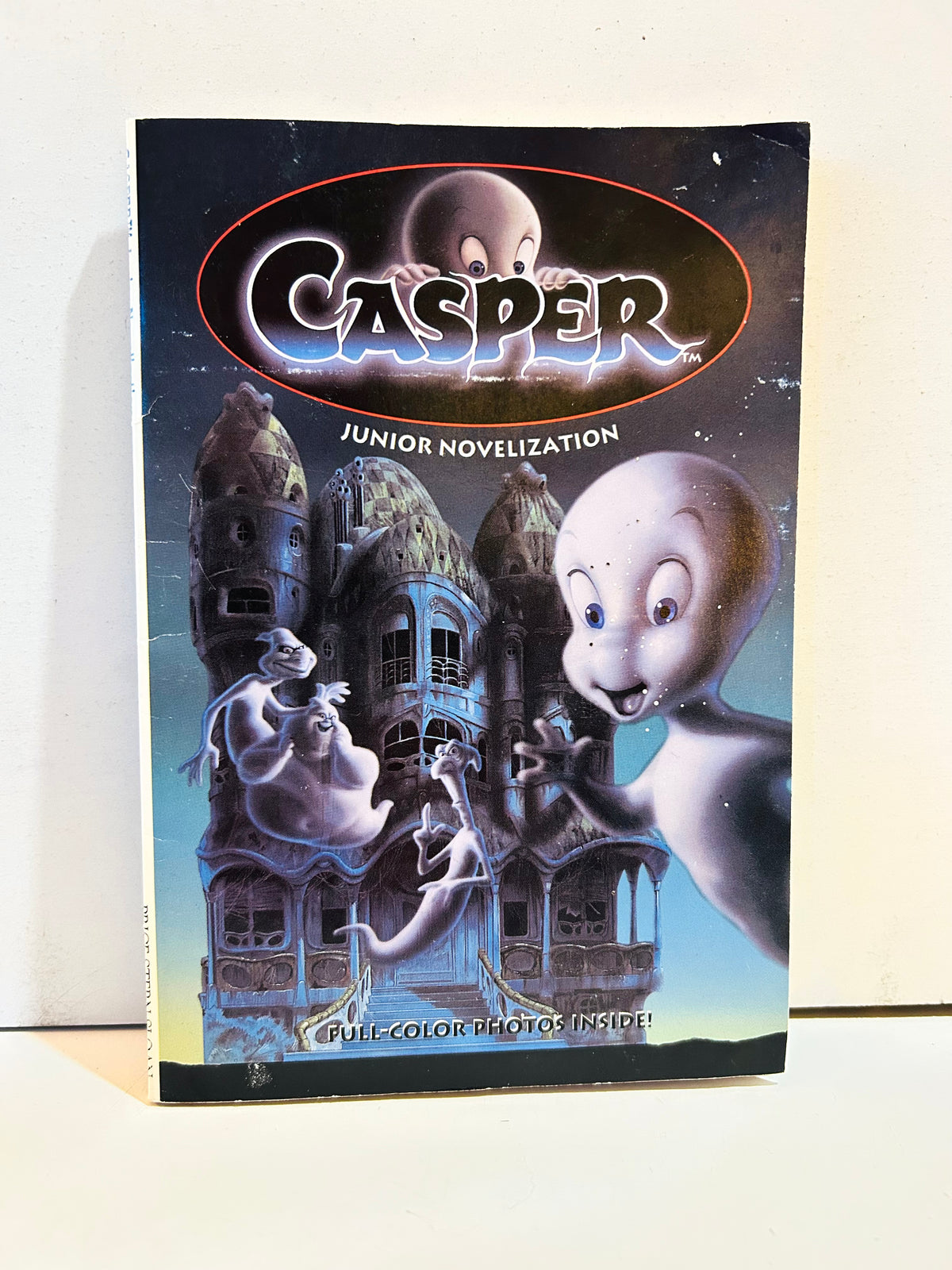 Casper Junior Novelization paperback front cover featuring Casper, ghosts, and a spooky mansion