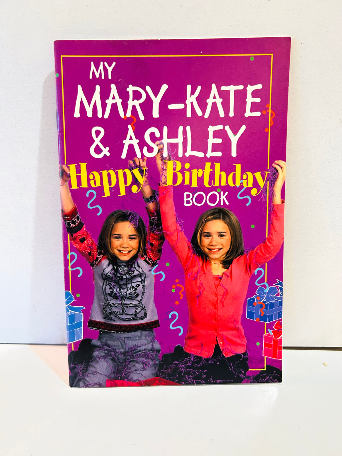 My Mary-Kate and Ashley Happy Birthday Book paperback with purple birthday-themed cover