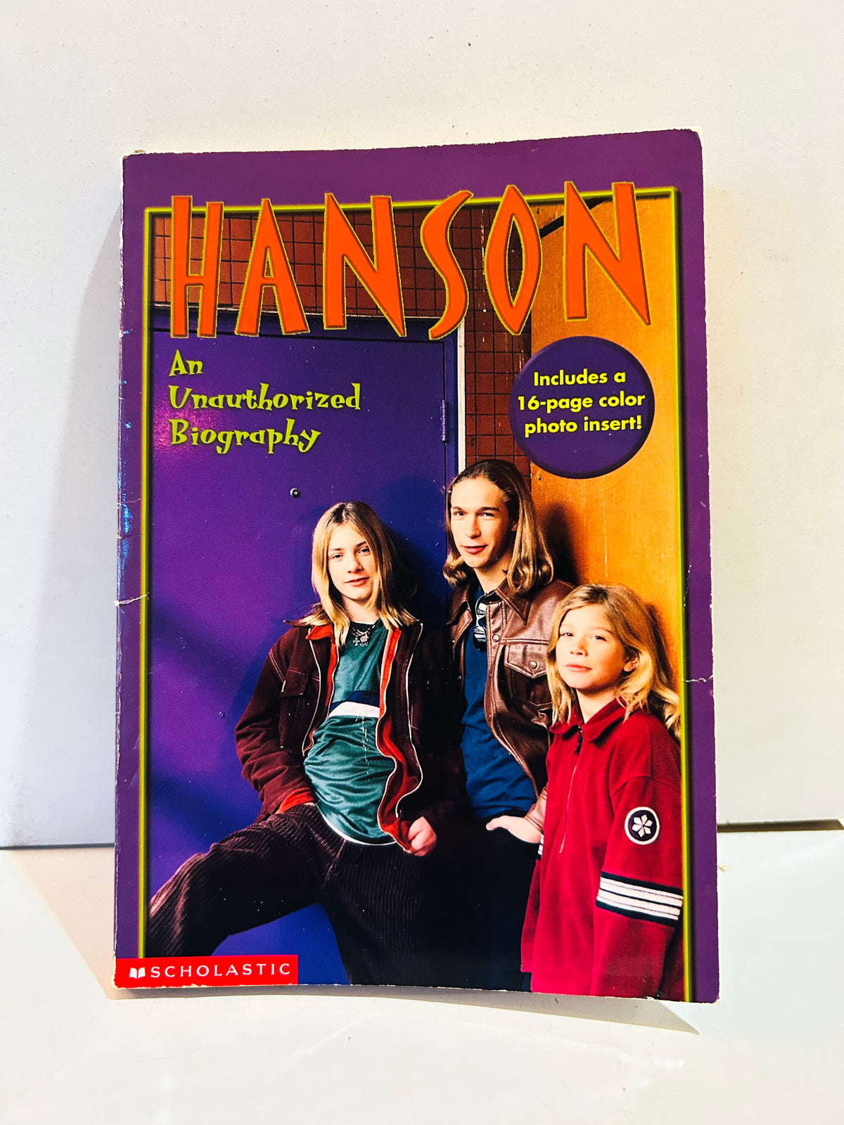 Hanson An Unauthorized Biography Scholastic paperback purple front cover showing wear