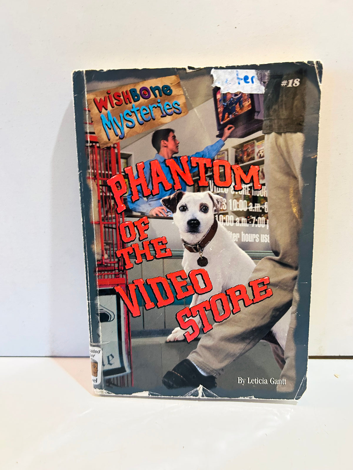 Wishbone Mysteries number 18 Phantom of the Video Store paperback showing cover wear and label remnants