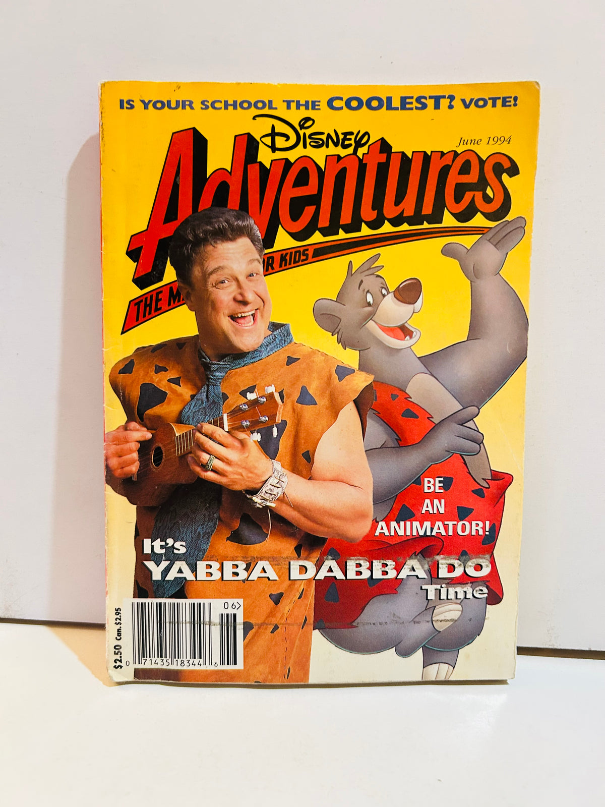 Disney Adventures The Magazine for Kids June 1994 cover featuring live-action Flintstones movie with Fred Flintstone celebrity and Baloo bear, Yabba Dabba Do Time headline, Be an Animator feature callout