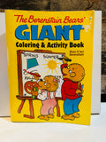 The Berenstain Bears Giant Coloring and Activity Book cover featuring Brother Bear and Sister Bear drawing Spring Summer Fall Winter seasons on an easel, bright yellow cover, by Stan and Jan Berenstain
