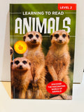 Learning to Read Animals Level 2 hardcover book cover featuring three meerkats standing upright, Teacher Approved seal, 2019 edition, Discover the Fascinating World of Animals