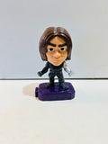 Marvel Winter Soldier Bucky Barnes chibi style mini collectible figure approximately 2 inches tall on purple display base wearing black tactical outfit with silver vibranium left arm detail and brown shoulder-length hair
