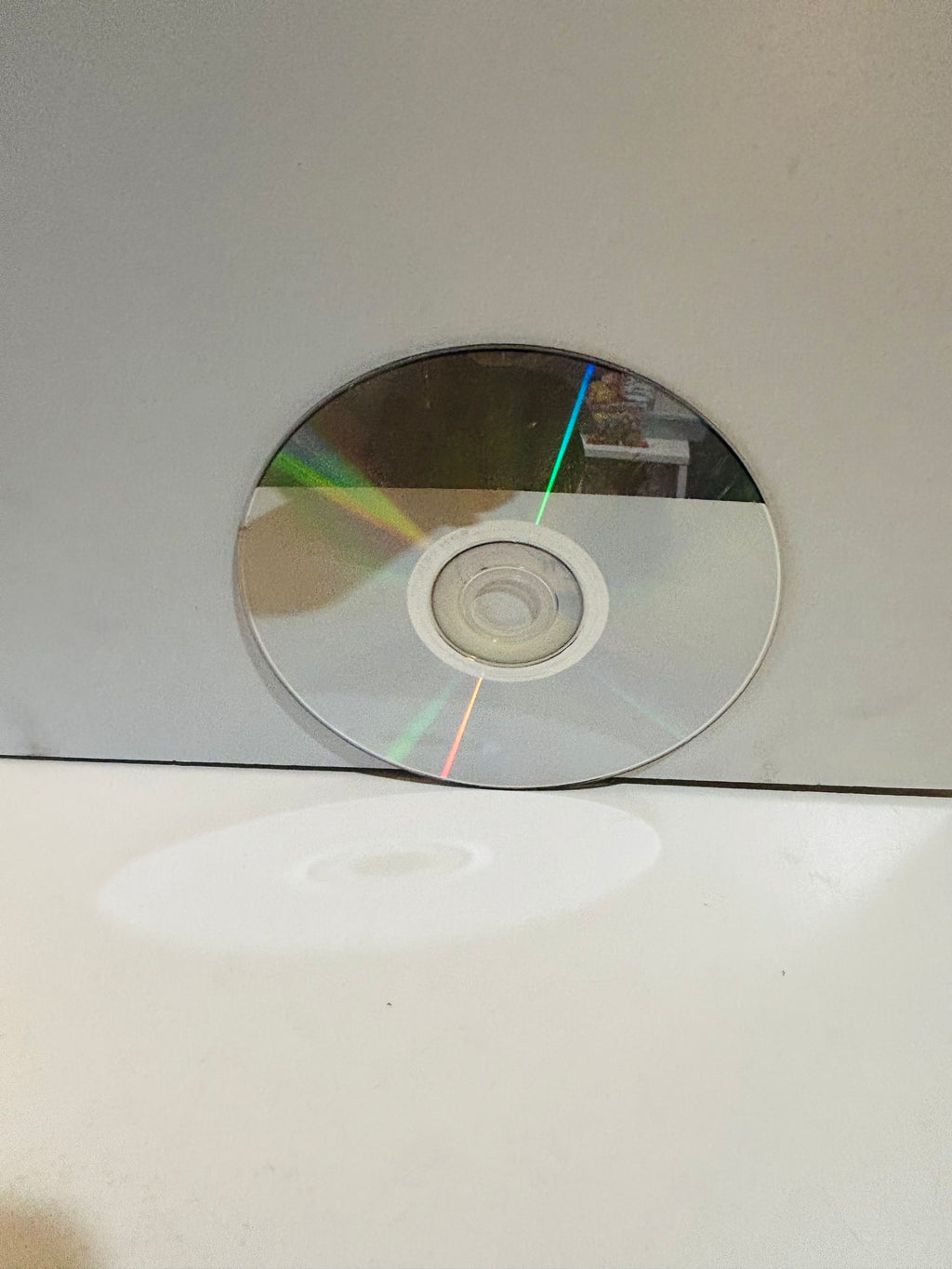 Back side of Noddy and Friends DVD disc showing silver underside with light surface scratches