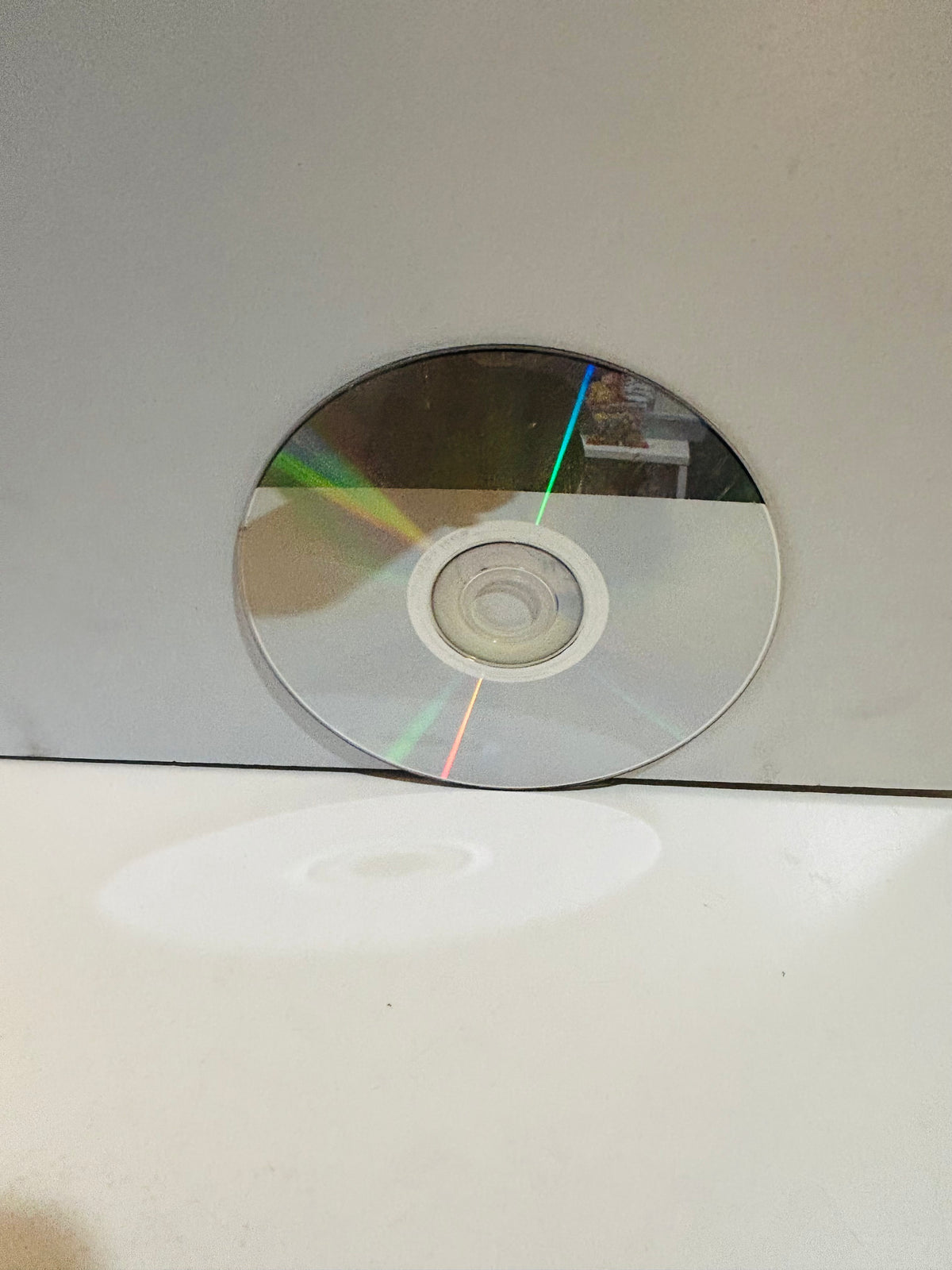 Back side of Noddy and Friends DVD disc showing silver underside with light surface scratches