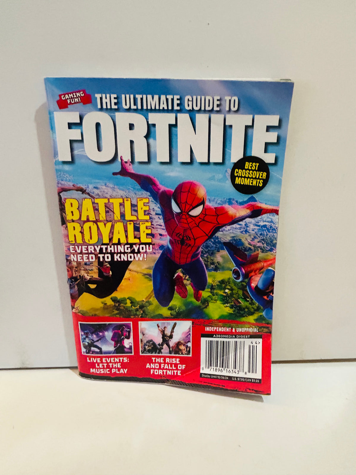 Gaming Fun The Ultimate Guide to Fortnite 2024 magazine 5x8 cover featuring Spider-Man swinging over Fortnite Battle Royale island, Best Crossover Moments badge, Live Events and Rise and Fall of Fortnite previews, A360 Media Digby, independent and unofficial