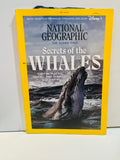 National Geographic Magazine May 2021 The Ocean Issue cover featuring Secrets of the Whales with humpback whale breaching ocean surface, Disney+ streaming tie-in callout, yellow border