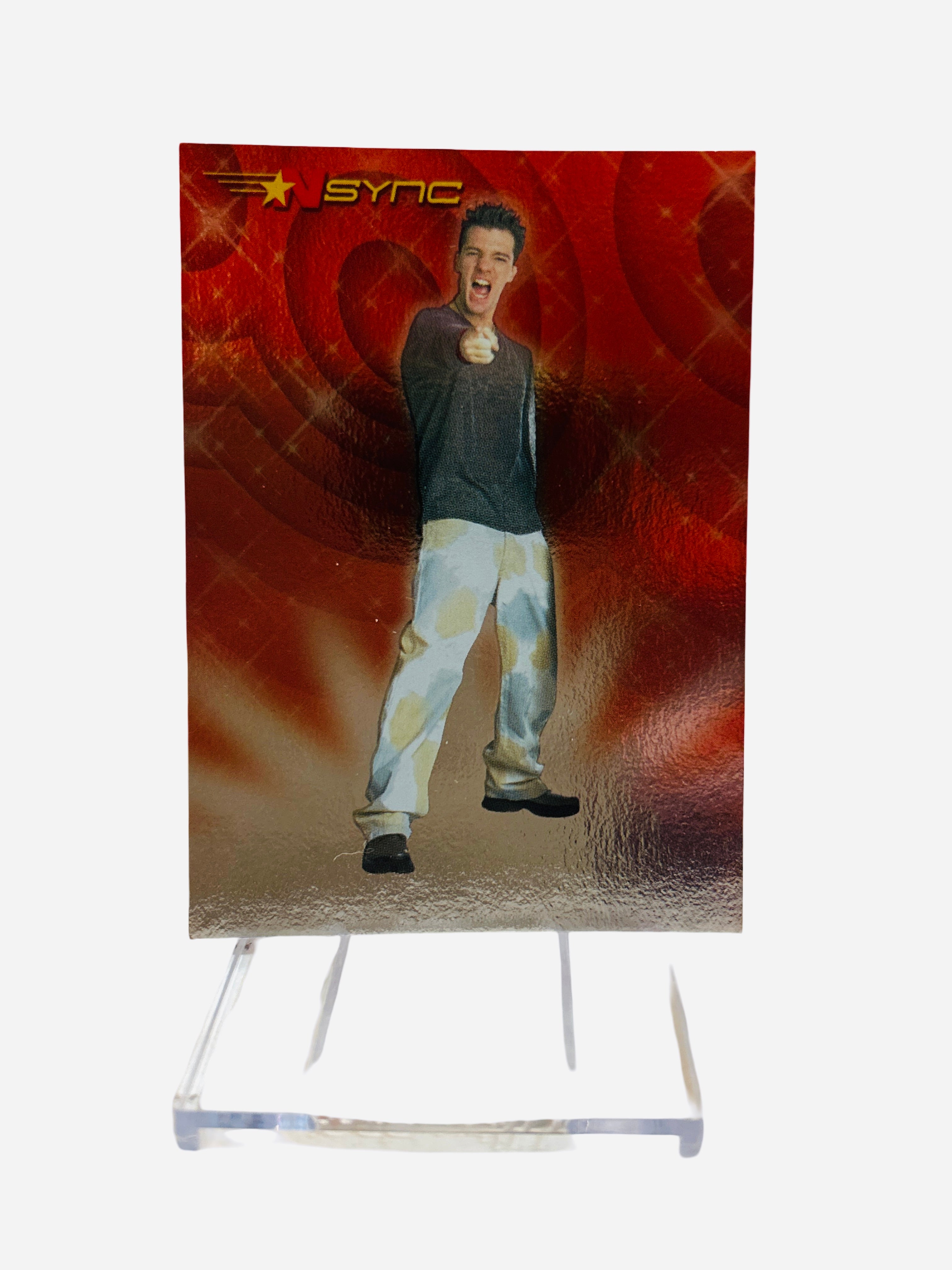 NSYNC Trading Card #9 Front – JC Chasez Dark Mesh Top Pointing Red Swirl Background 2000 Topps Winterland