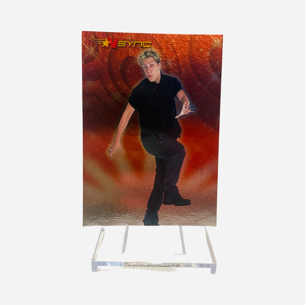 NSYNC Trading Card #11 Front – Lance Bass All-Black Outfit Mid-Dance Fiery Red Swirl Background 2000 Topps Winterland