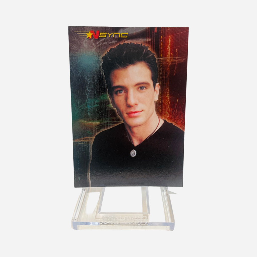 NSYNC Trading Card #19 Front – JC Chasez Black V-Neck Tee Silver Coin Necklace Soft Smile Dark Atmospheric Teal Fiery Background 2000 Topps Winterland