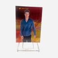 NSYNC Trading Card #29 Front – JC Chasez Spiky Dark Hair Blue Satin Long-Sleeve Button-Up Pendant Necklace Red Gold Grid Background 2000 Topps Winterland