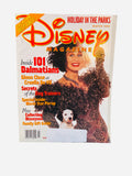 Disney Magazine Winter 1996 - Cover featuring Glenn Close as Cruella De Vil from 101 Dalmatians holding a Dalmatian puppy