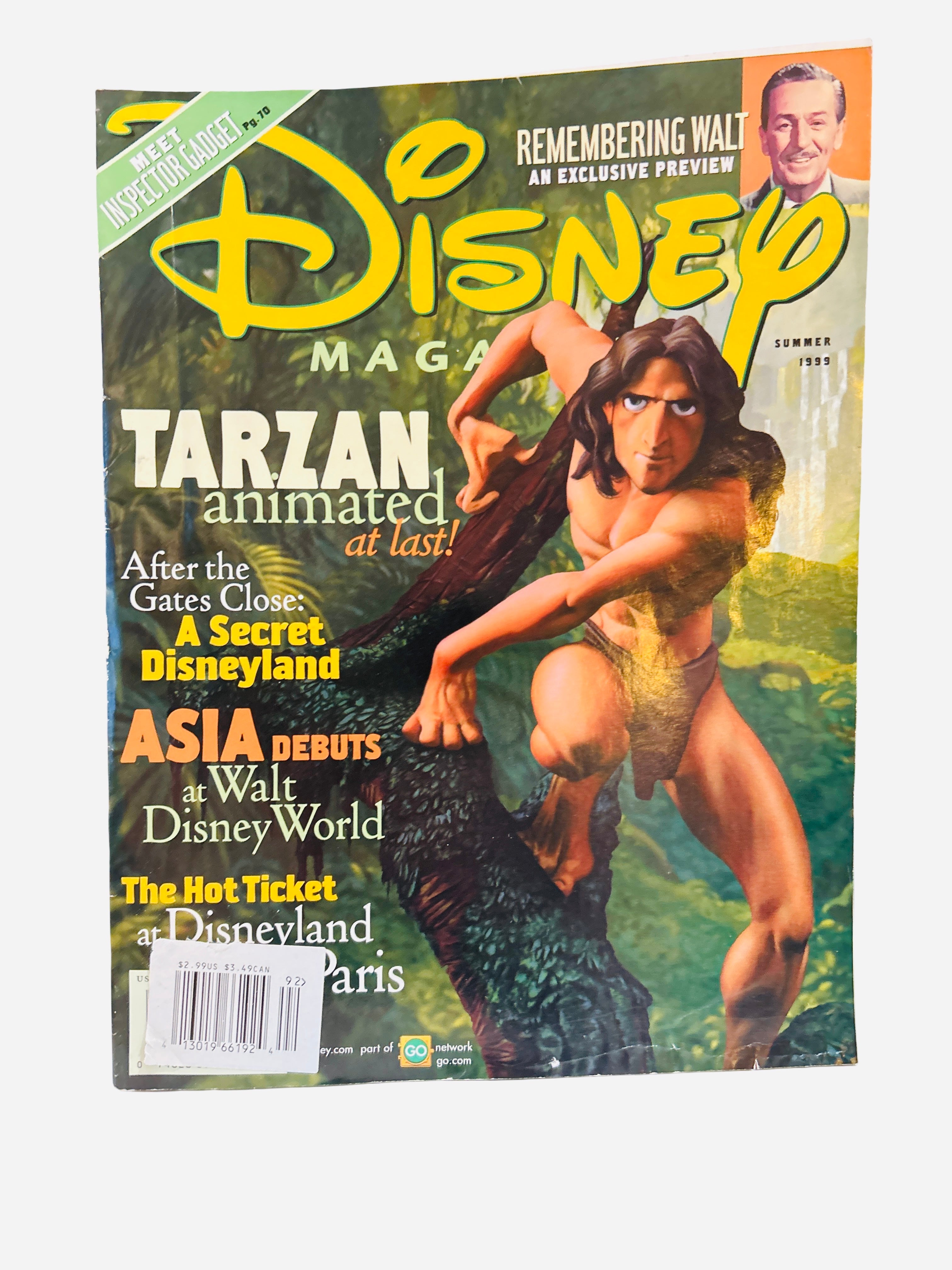 Disney Magazine Summer 1999 - Cover featuring Tarzan animated character swinging through jungle