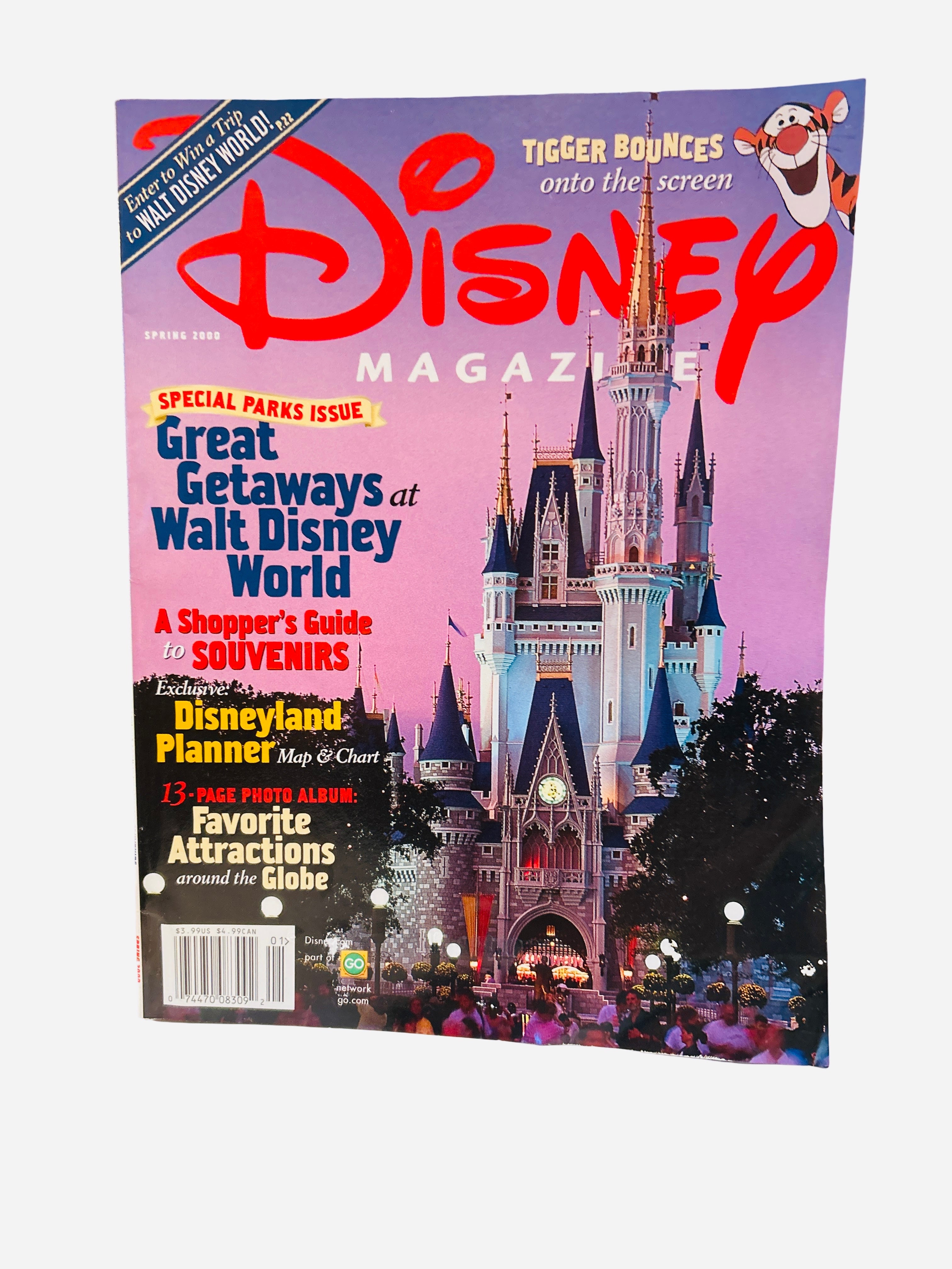 Disney Magazine Spring 2000 Special Parks Issue - Cover featuring Cinderella Castle at dusk with Tigger in corner