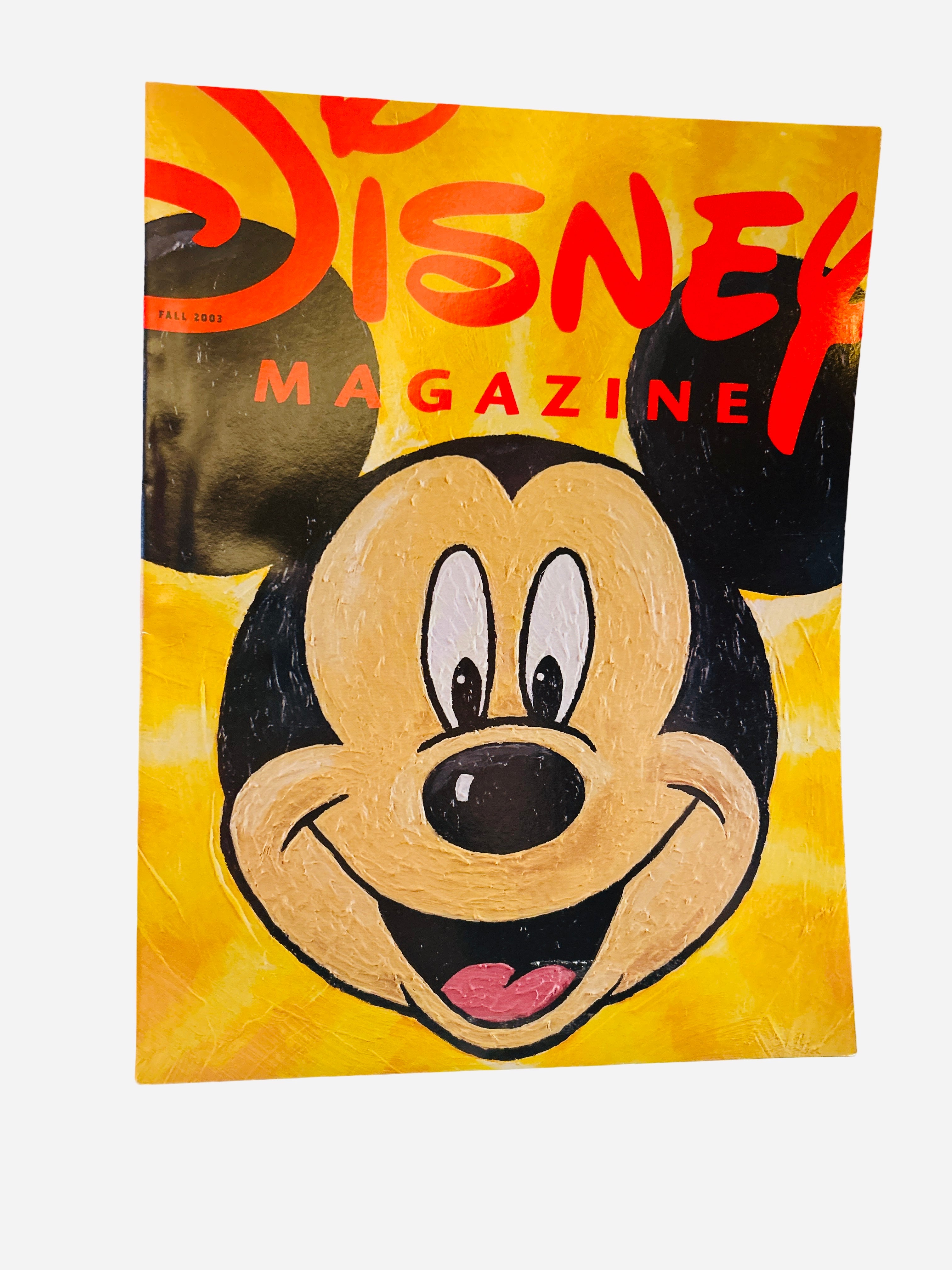 Disney Magazine Fall 2003 - Cover featuring a large painted close-up portrait of Mickey Mouse on a golden yellow background