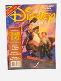 Disney Magazine Winter 2002-2003 - Cover featuring Long John Silver and Jim Hawkins from Treasure Planet on a ship deck at sunset
