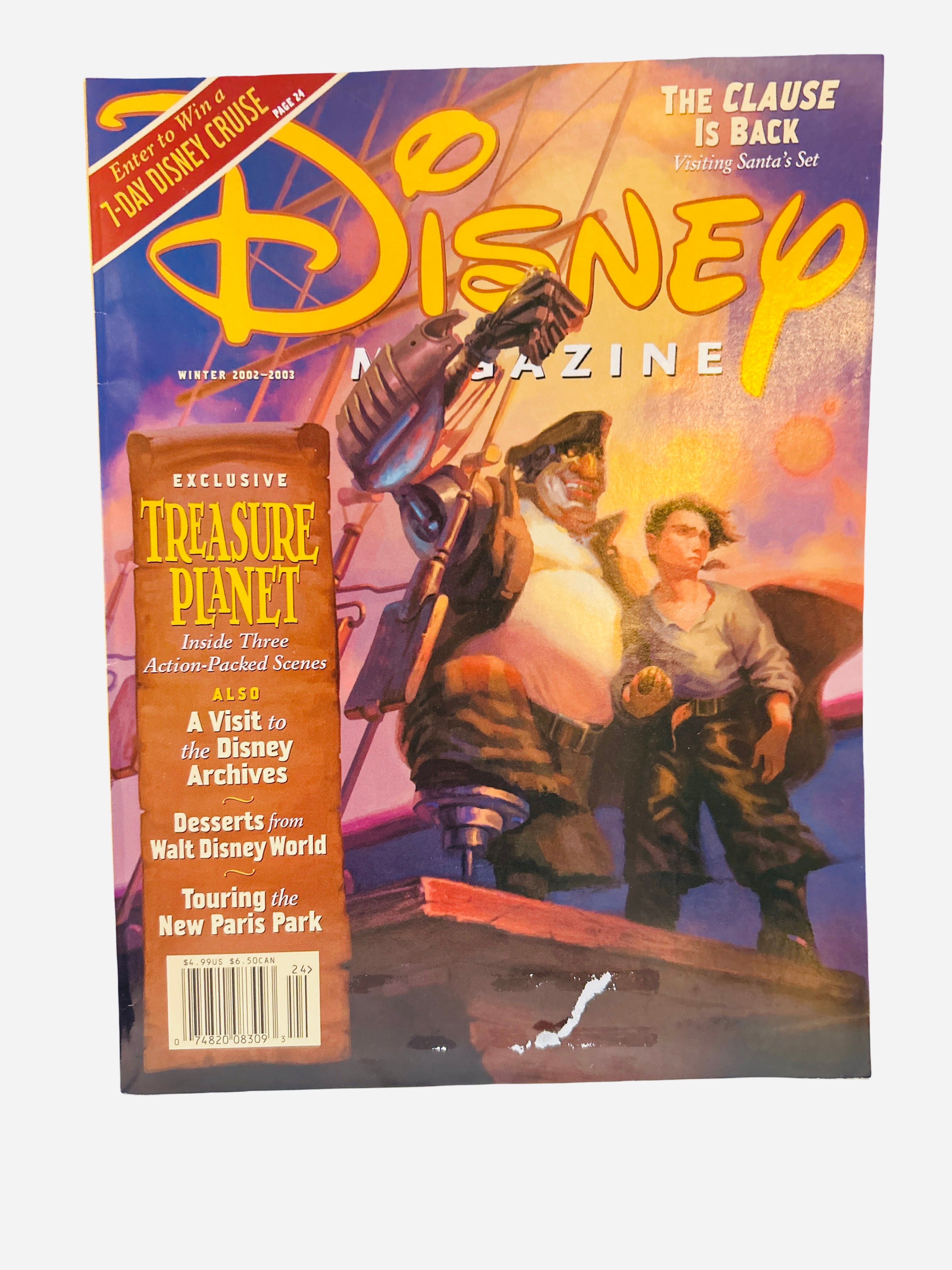 Disney Magazine Winter 2002-2003 - Cover featuring Long John Silver and Jim Hawkins from Treasure Planet on a ship deck at sunset