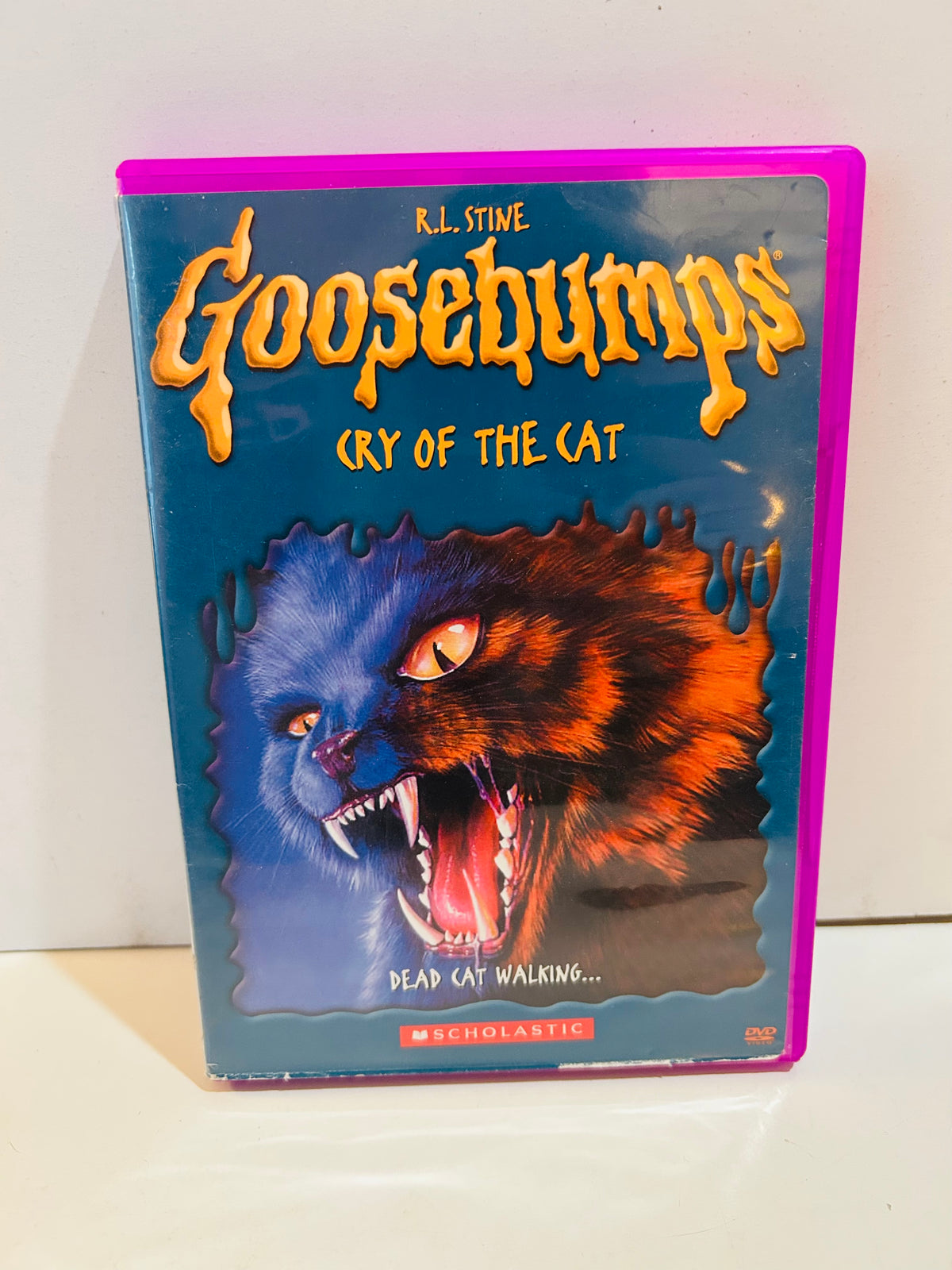 R.L. Stine Goosebumps Cry of the Cat DVD in a purple case with snarling cat cover artwork