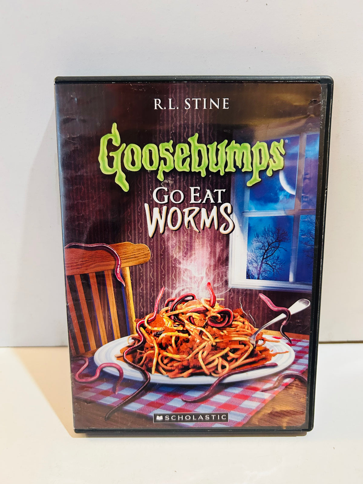 R.L. Stine Goosebumps Go Eat Worms DVD in black case with worms and spaghetti cover artwork
