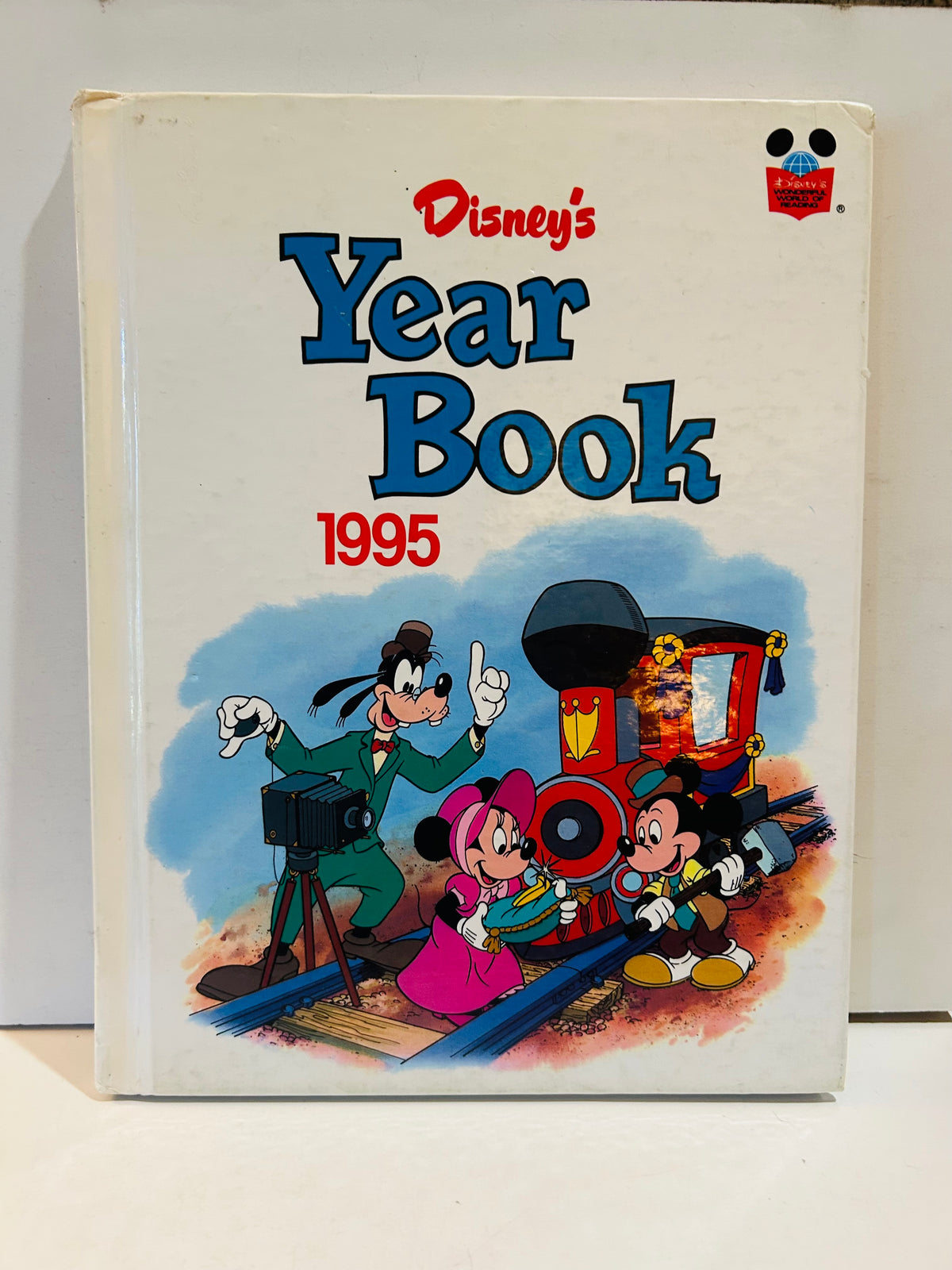 Disney's Year Book 1995 hardcover with Mickey Mouse, Minnie Mouse, and Goofy on the cover
