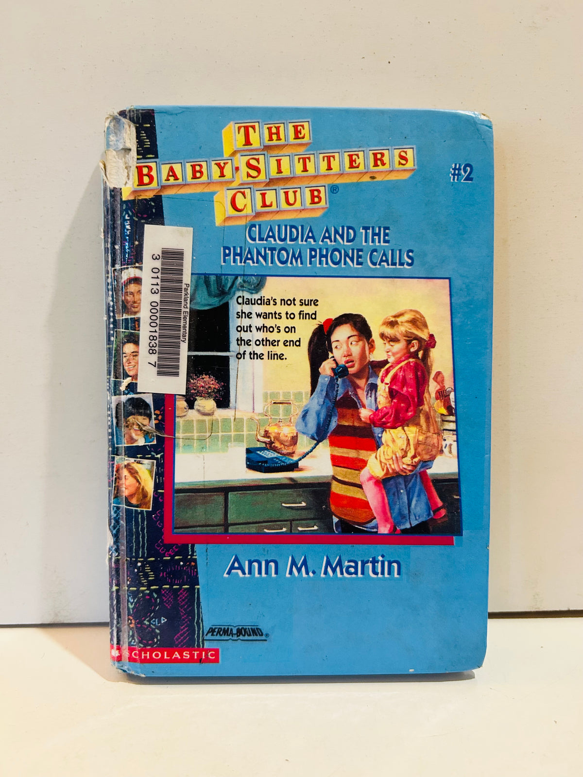 Worn ex-library hardcover of Claudia and the Phantom Phone Calls, Baby-Sitters Club book 2, with barcode sticker
