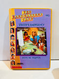Ex-library hardcover of Stacey's Emergency, Baby-Sitters Club #43, with white label over part of cover illustration
