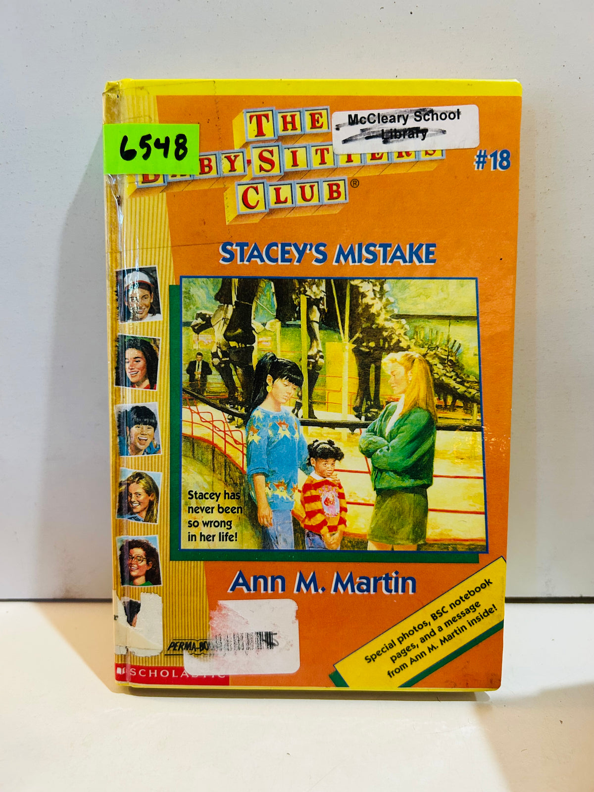 Ex-library hardcover of Stacey's Mistake, Baby-Sitters Club #18, with library labels and stickers on the cover