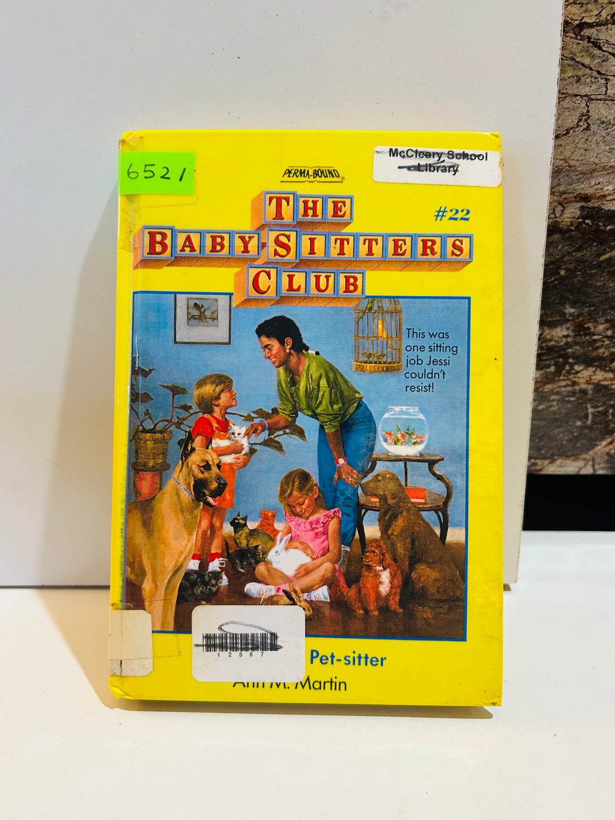 Ex-library hardcover of Jessi Ramsey, Pet-Sitter, Baby-Sitters Club book 22, with library stickers visible on cover
