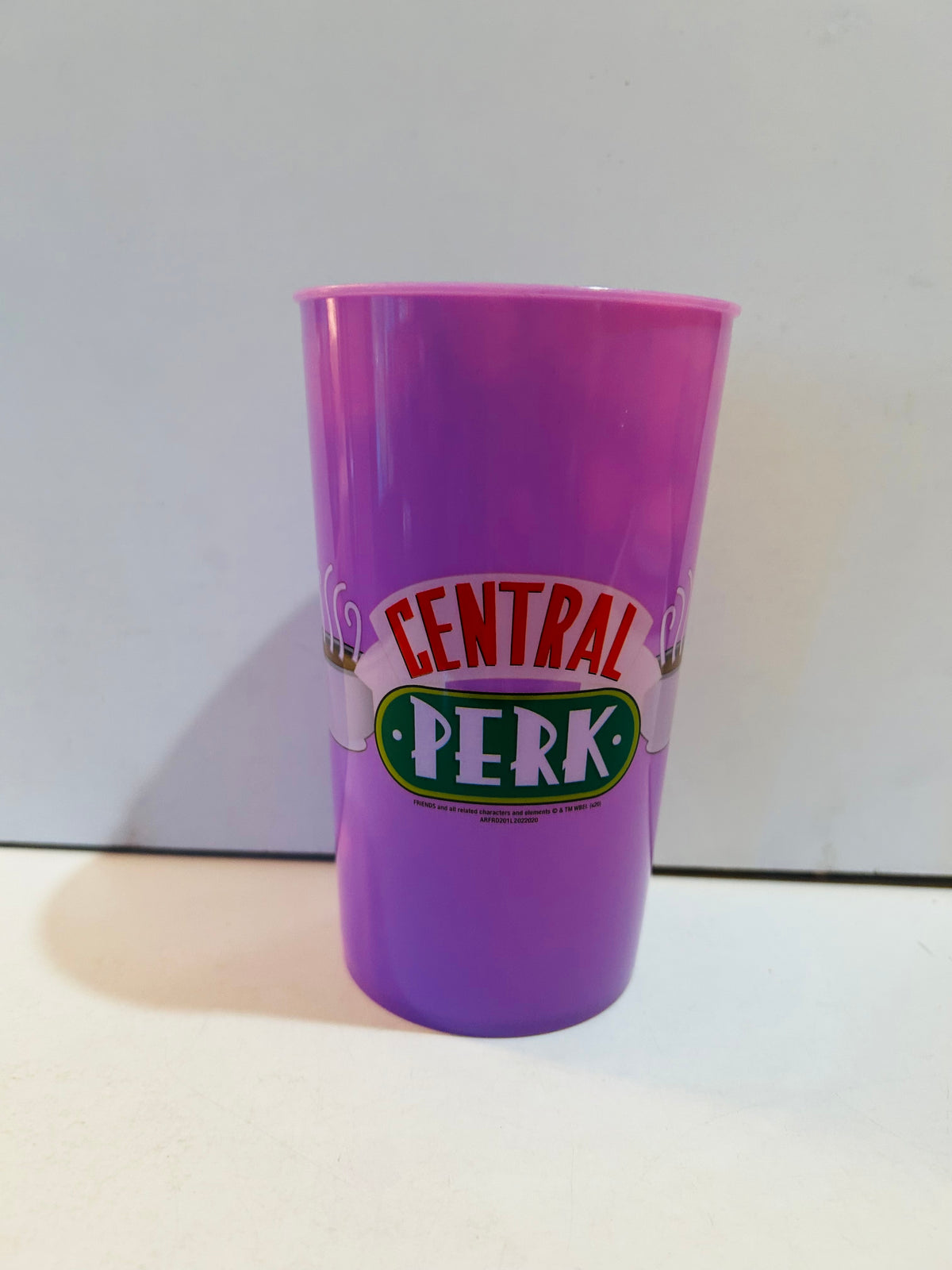 Purple 6-inch plastic cup featuring Central Perk logo