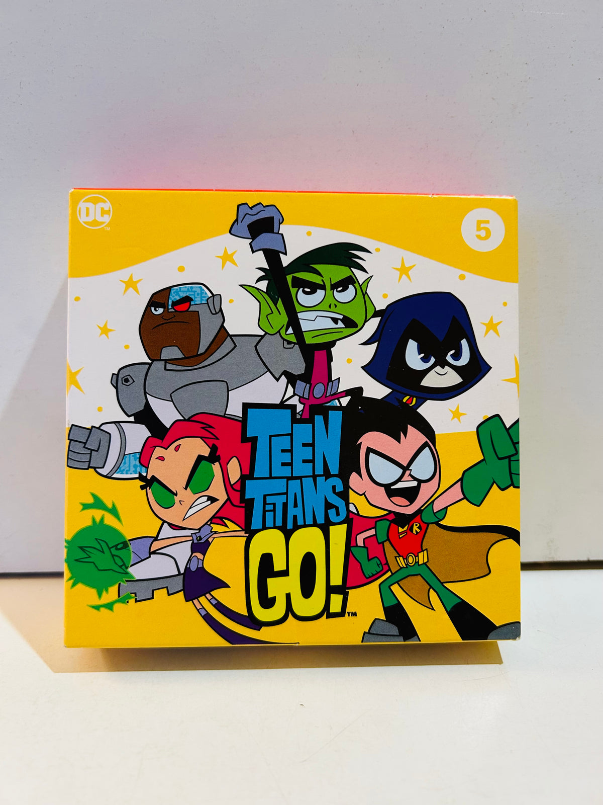 Yellow DC Teen Titans Go number 5 Happy Meal toy box front