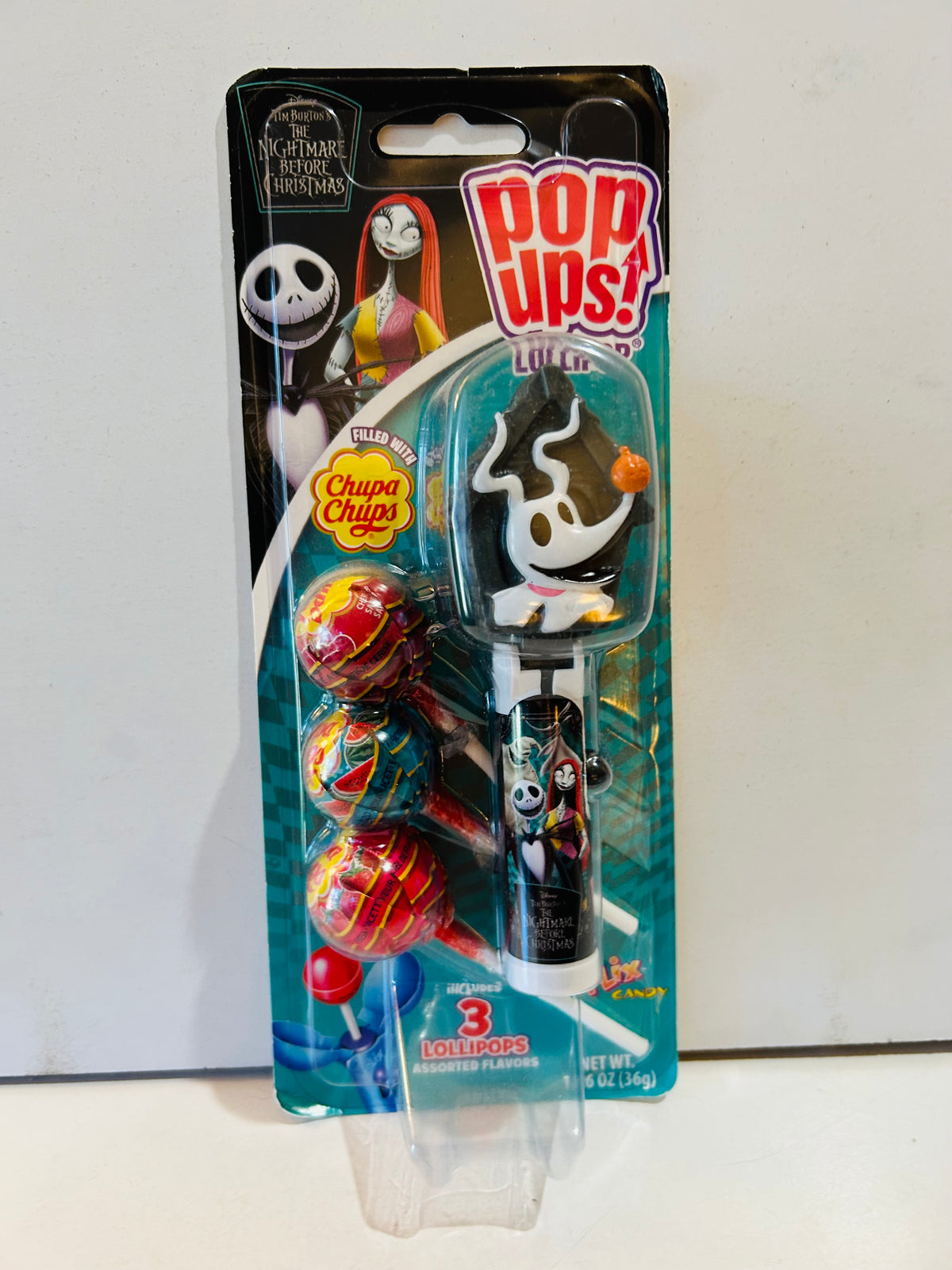 Packaged Zero ghost dog Pop Ups lollipop holder with three Chupa Chups lollipops