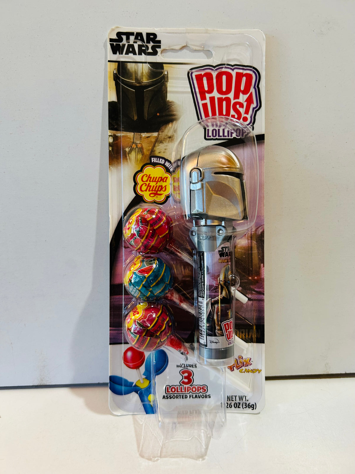 Packaged Star Wars Mandalorian helmet Pop Ups lollipop holder with three Chupa Chups lollipops