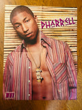 Pharrell poster side with striped shirt and bamboo background