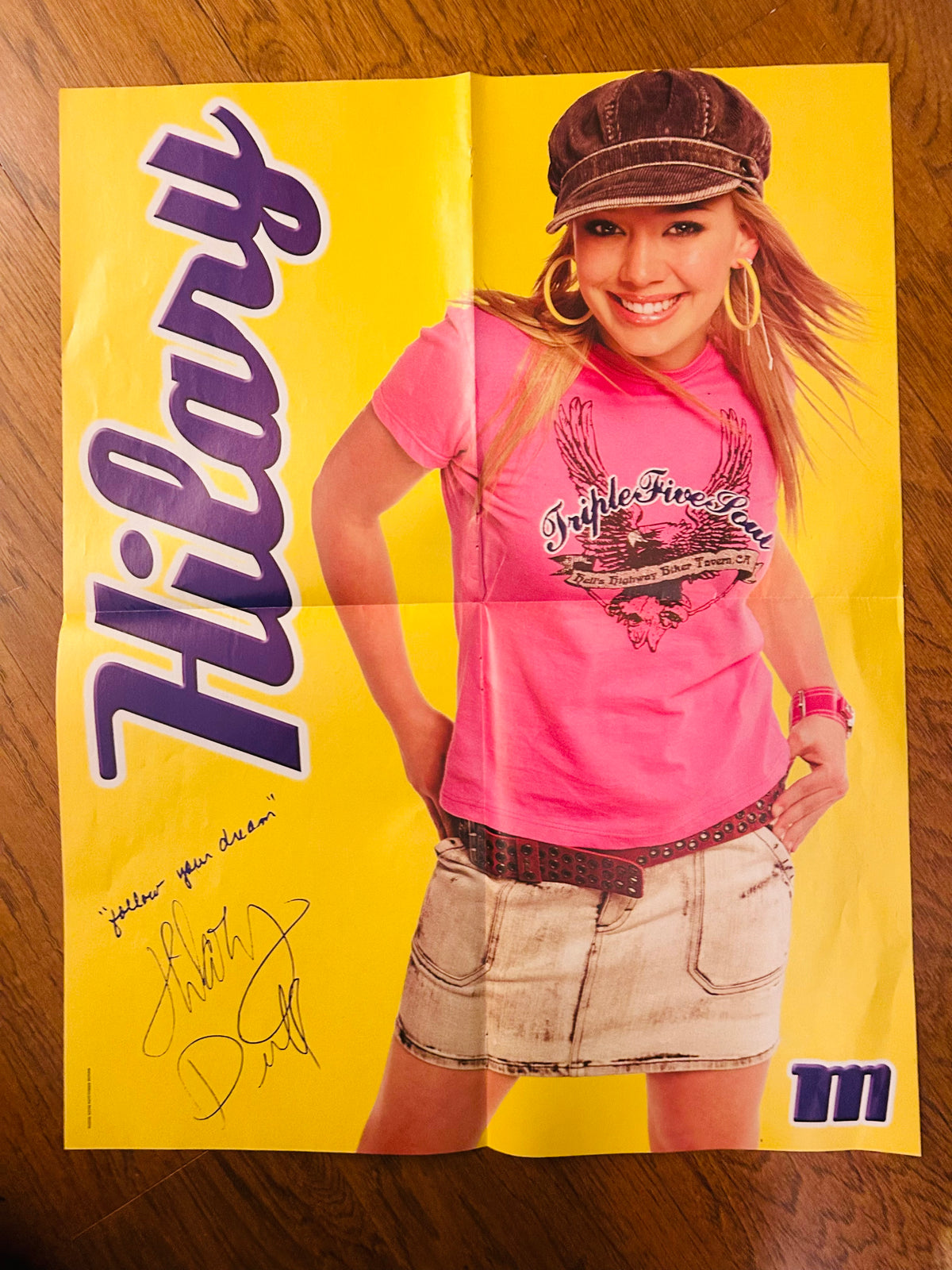 Hilary Duff poster reverse with yellow background, showing fold creases