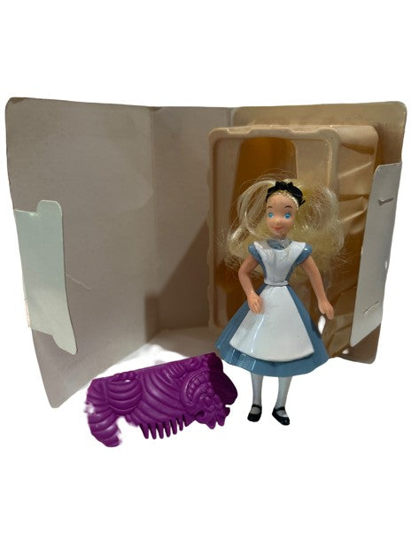 Alice in Wonderland poseable figure with Cheshire Cat comb in original packaging