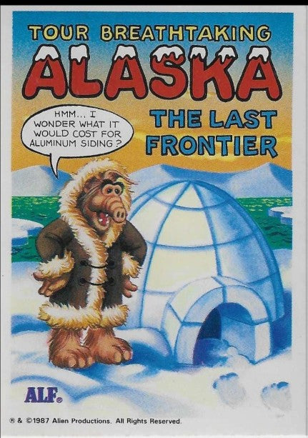 U.S. of ALF Alaska sticker featuring ALF in fur parka next to igloo wondering about aluminum siding cost