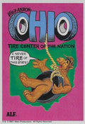 U.S. of ALF Ohio sticker featuring ALF swinging on rope tire swing inside Ohio state silhouette with tire-styled OHIO lettering saying I never tire of this state