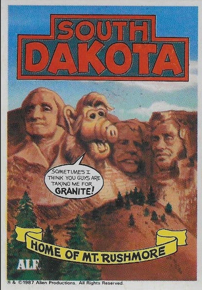 U.S. of ALF South Dakota sticker featuring ALF's face carved into Mt. Rushmore alongside Washington Jefferson and Lincoln saying sometimes I think you guys are taking me for granite
