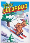 U.S. of ALF Colorado sticker featuring ALF skiing downhill through snowy mountain scene saying its all downhill from here