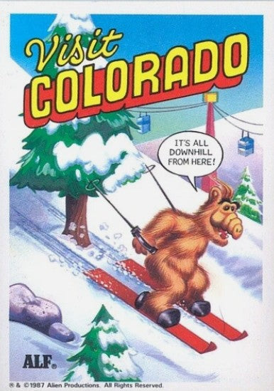 U.S. of ALF Colorado sticker featuring ALF skiing downhill through snowy mountain scene saying its all downhill from here