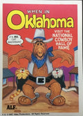 U.S. of ALF Oklahoma sticker featuring ALF in cowboy hat and bandana with orange and white cats holstered on each hip saying It's me Cat Masterson