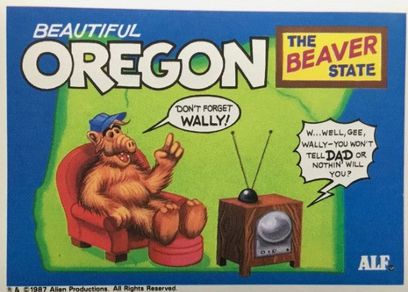 U.S. of ALF Oregon sticker featuring ALF in baseball cap in armchair pointing at vintage TV set with Leave It to Beaver Wally joke on lime green background