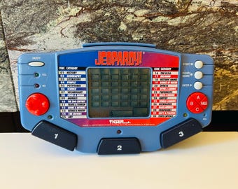 Jeopardy 1995 Tiger Electronic Handheld Video Game (BATTERIES NOT INCLUDED)